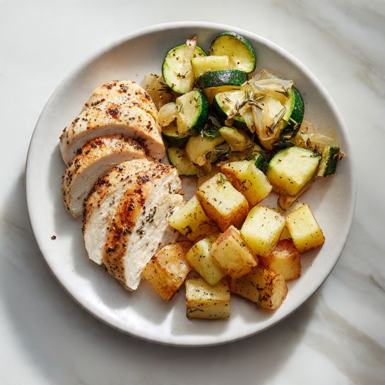 Golden Seared Chicken with Roasted Potatoes and Sautéed Zucchini Recipe - Recipe Image