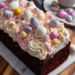 Mini Egg Chocolate Loaf Cake with Colorful Buttercream frosting and Mini Egg Decorations Recipe