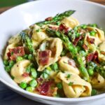 Creamy Spring Tortellini with Peas, Asparagus, and Bacon Recipe