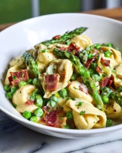 Creamy Spring Tortellini with Peas, Asparagus, and Bacon Recipe